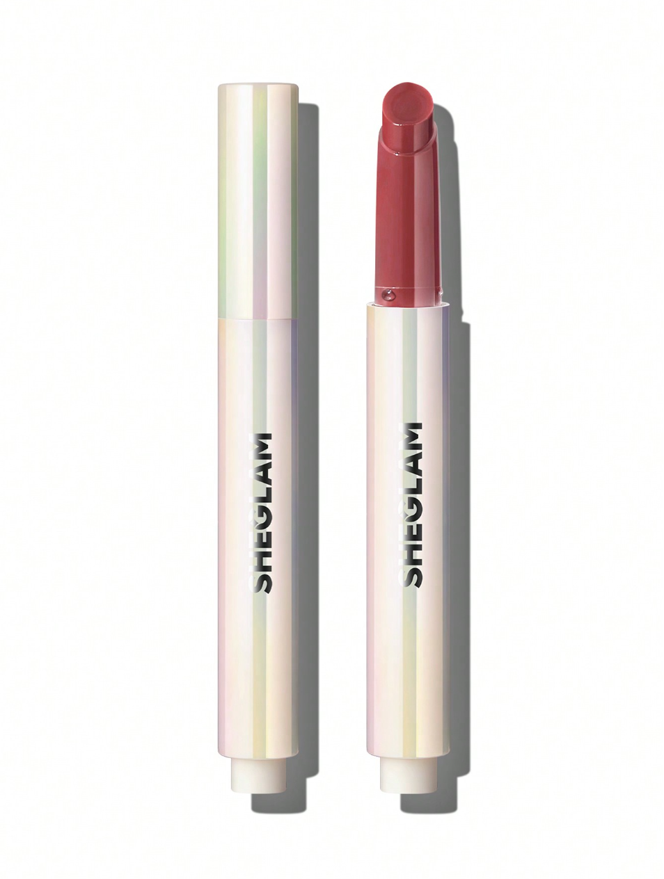 Sheglam Lip Plumper Pout-Perfect Shine offering glossy, plump lips with rich color payoff and hydration from coconut and grape seed oil for smooth comfort.