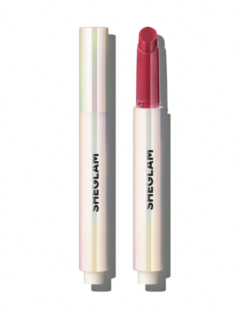 Sheglam Lip Plumper Pout-Perfect Shine offering glossy, plump lips with rich color payoff and hydration from coconut and grape seed oil for smooth comfort.