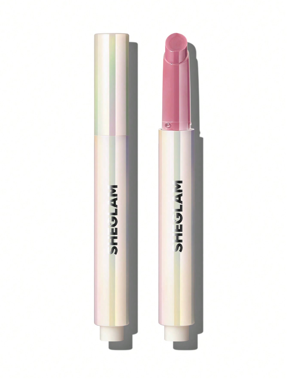 Sheglam Lip Plumper Pout-Perfect Shine offering glossy, plump lips with rich color payoff and hydration from coconut and grape seed oil for smooth comfort.
